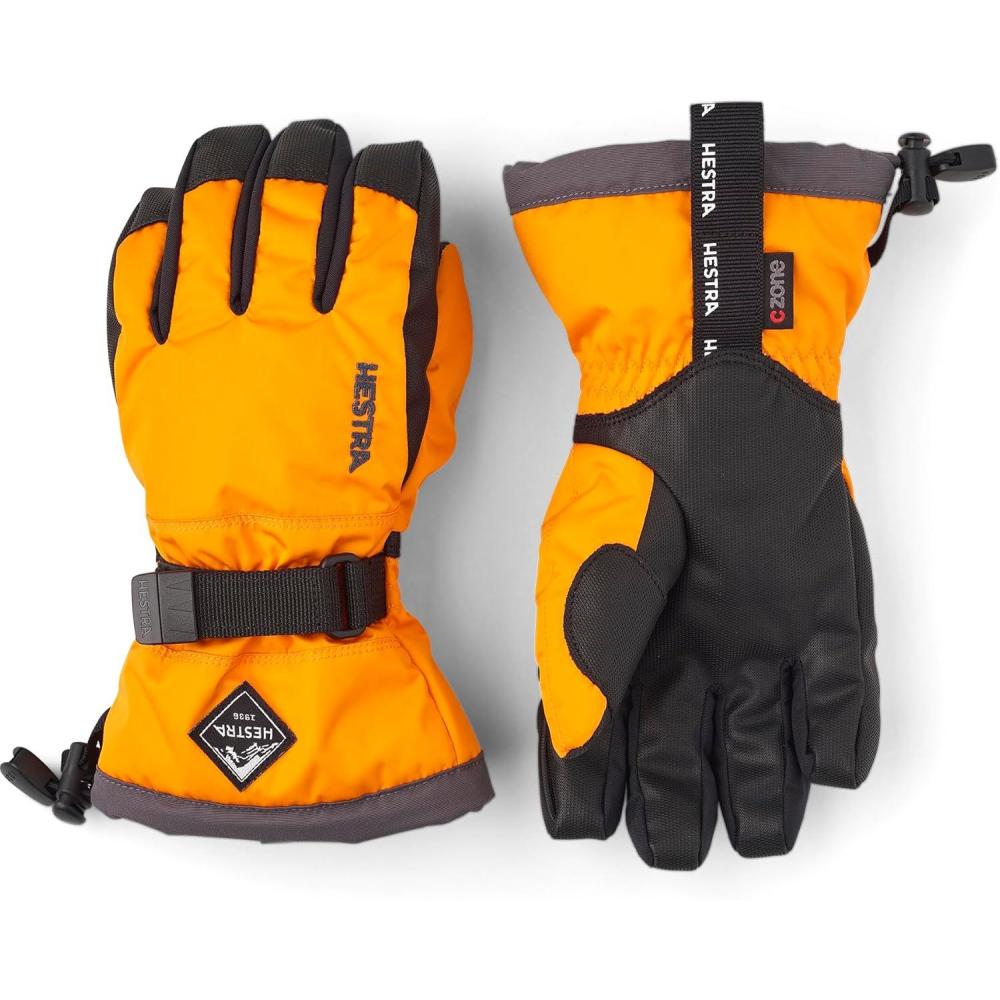imageHestra Gauntlet CZone Junior Glove Youth 414yrs  Waterproof Insulated Kids Gloves for Winter Skiing SnowboardingOrange  Graphite