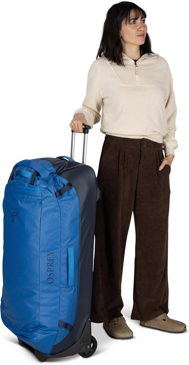 imageOsprey Transporter 90L Wheeled Travel Duffel Bag Large Lightweight Rolling Suitcase for Men and Women Raven BlackBlue FlameNocturnal Blue