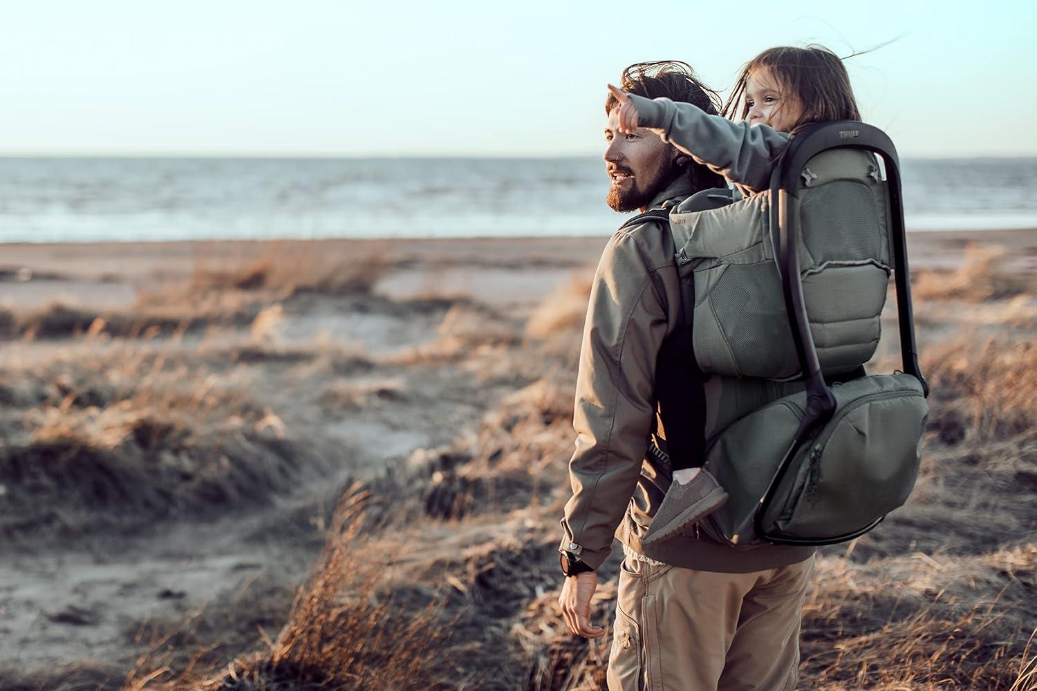 imageThule Sapling Child Carrier Backpack Machine Washable Seat SelfStanding Frame Adjustable padded straps for parents Ergonomic seat with underleg support for child UPF 50 SunshadeAGAVE