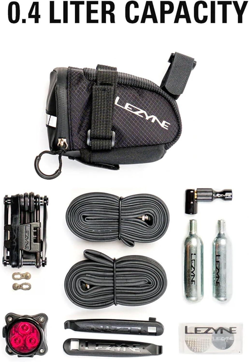 imageLEZYNE Caddy Bike Saddle Bag Durable Nylon Cycling Storage Bag with VelcroQuick Release Mount Reflective Accents WaterResistant Zipper for Road Bikes ampamp CommutersMedium