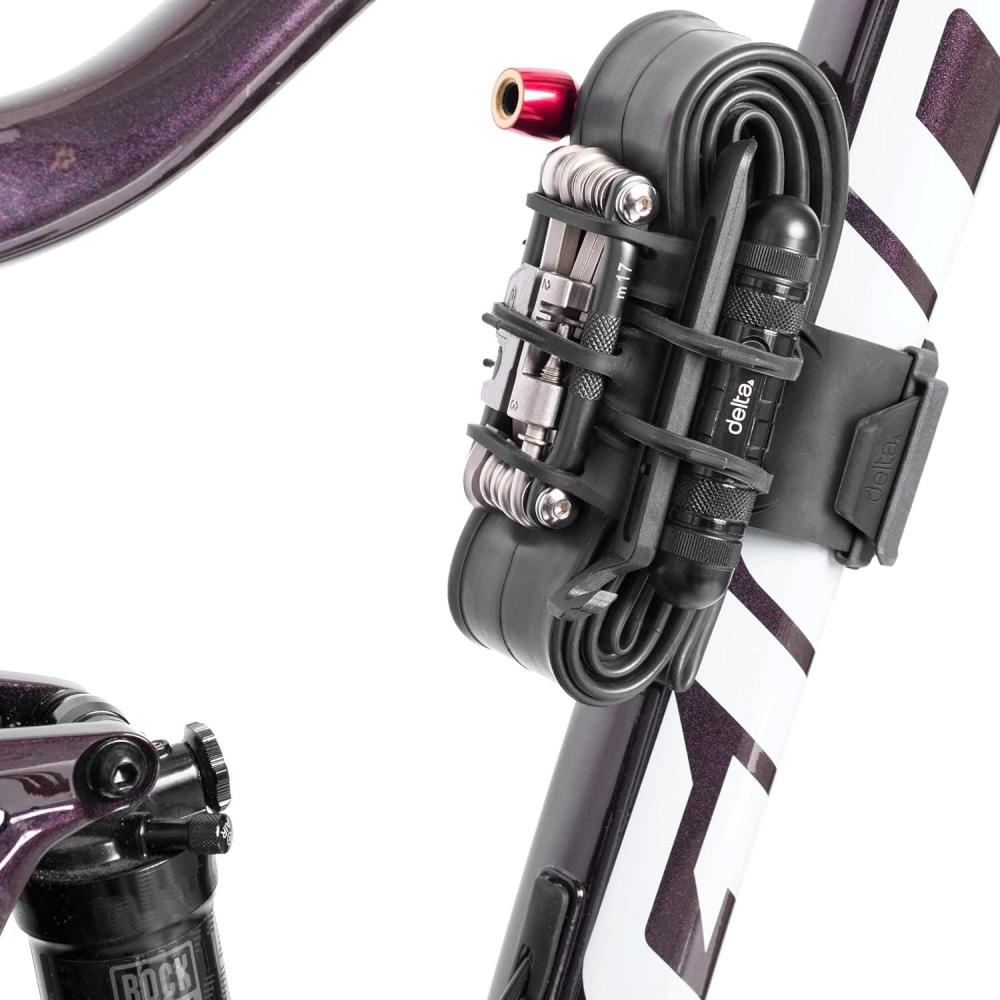 imageBike Frame Carrier Strap MTB with Tire Plugger Kit Stwap by Delta Cycle Mountain Bike Strap with Integrated Storage Loops for CO2 Inflator Tubes Bike Tool Kit and MoreStorage Repair Strap Black